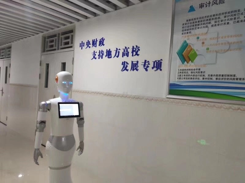 Humanoid facial recognition reception Robot